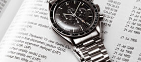Omega Watch on top of newspaper